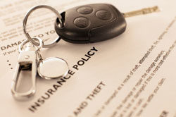 Car insurance document and car keys - photo