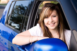 Young Lady Sitting in Car - photo