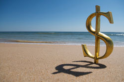 Currency Symbol On Holiday Beach - photo