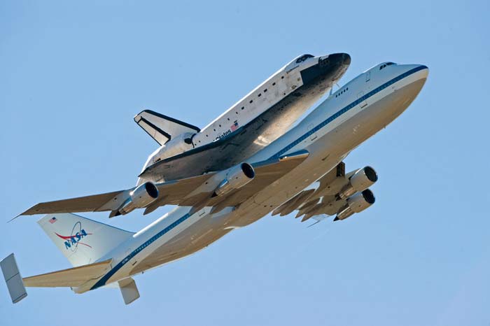 Shuttle being carried by 747 aircraft