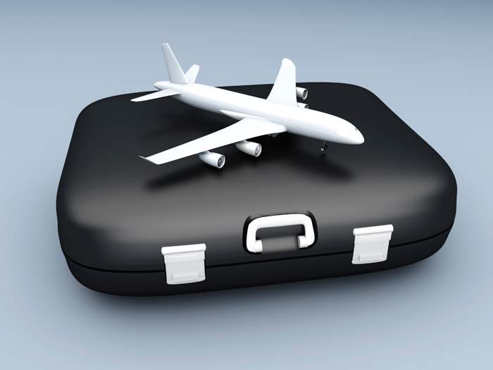 suitcase with model plane on top