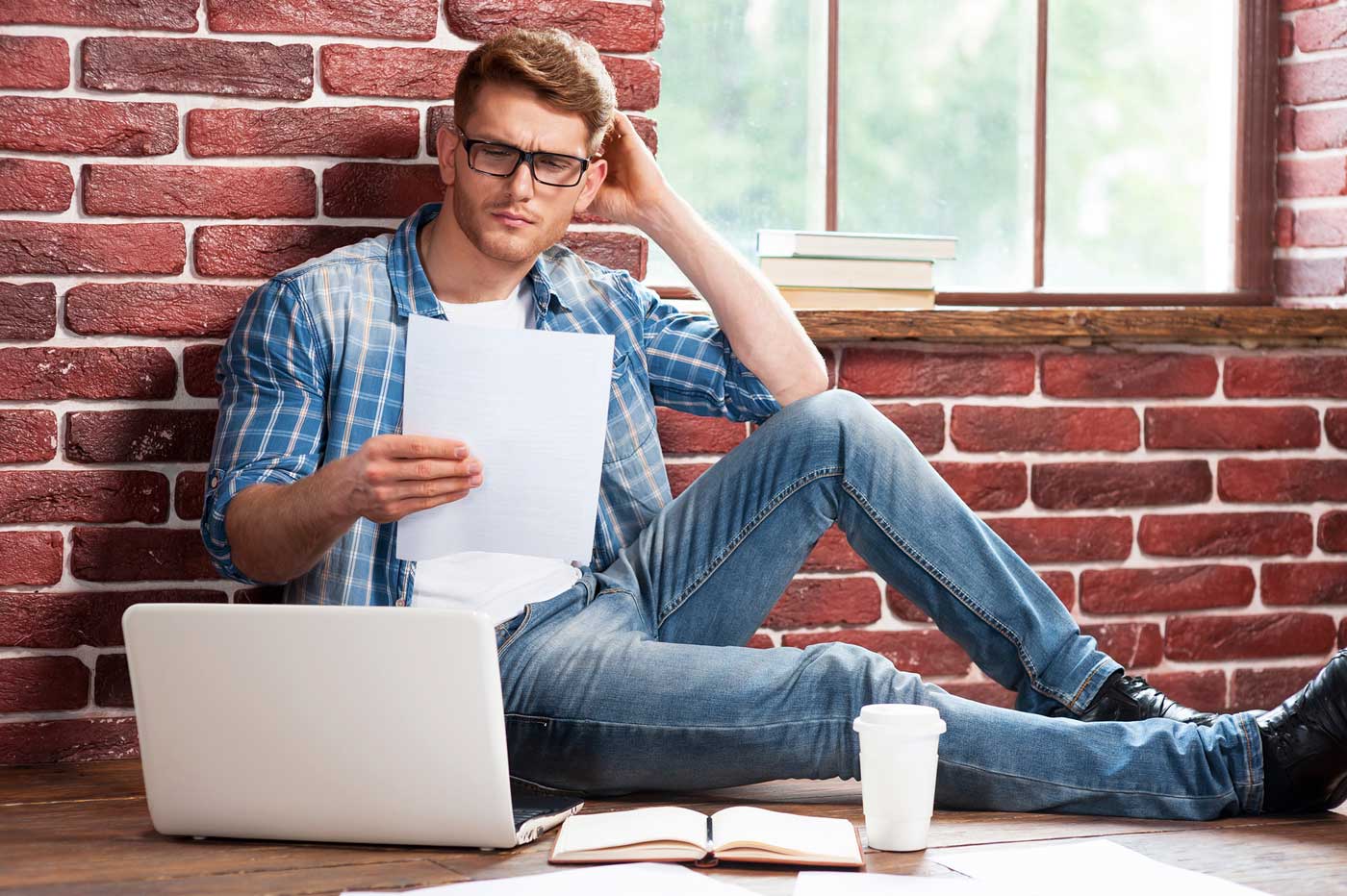 Student looking through his money budgets