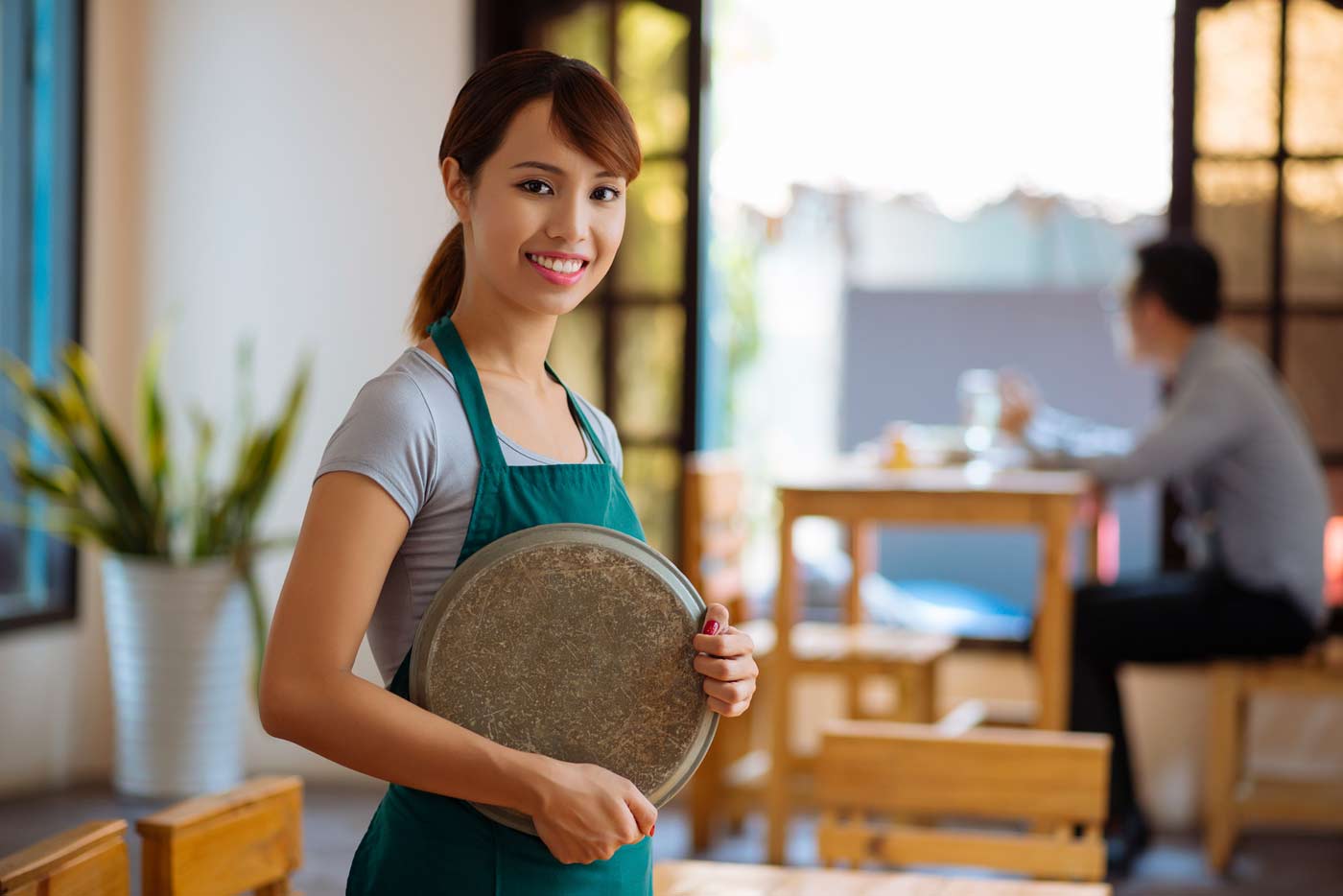 Student working at a coffee shop