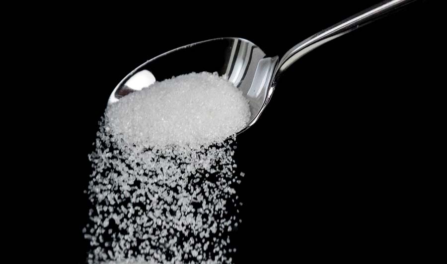 Sugar on teaspoon