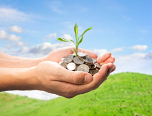 Hands holding money for retirement